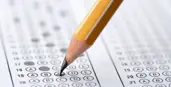 "A pencil filling in an exam answer bubble"